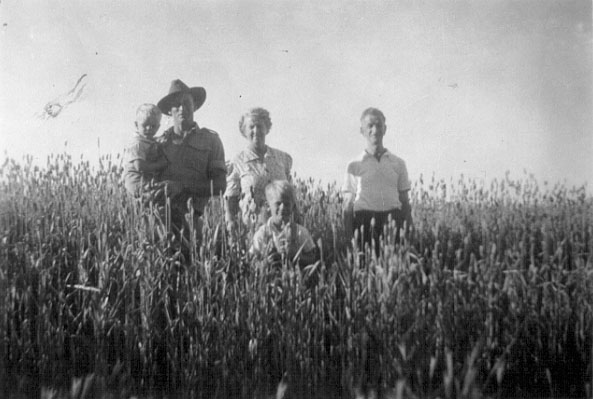 Dalwallinu, 1948 or 1949. Bill (holding Roger), 'Nanna' (Bella), Gordon, 'Pardie' (Tom)